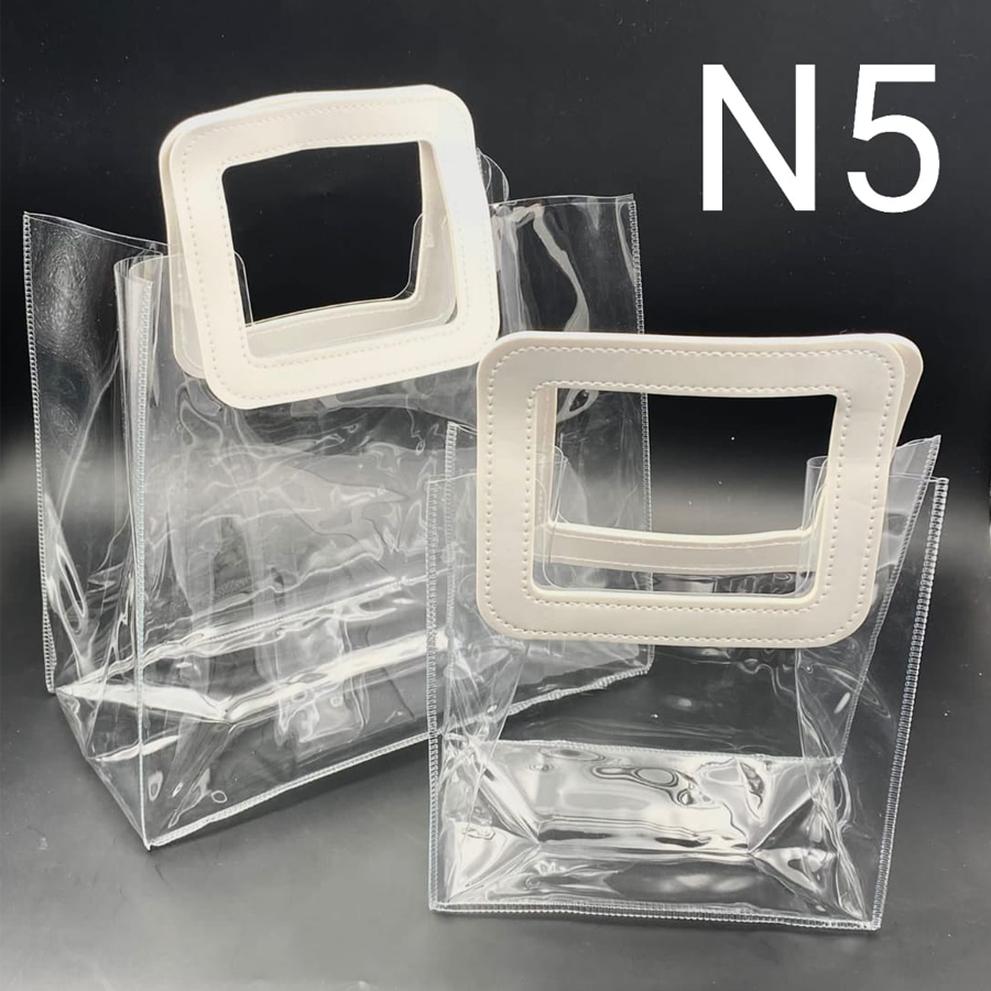 BOLSA DE PLÁSTICO TRANSPARENTE CON ASA